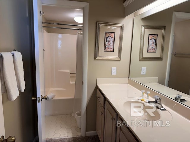 bathroom featuring washtub / shower combination and vanity