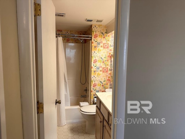 full bathroom with vanity, tile patterned floors, toilet, and shower / tub combo with curtain