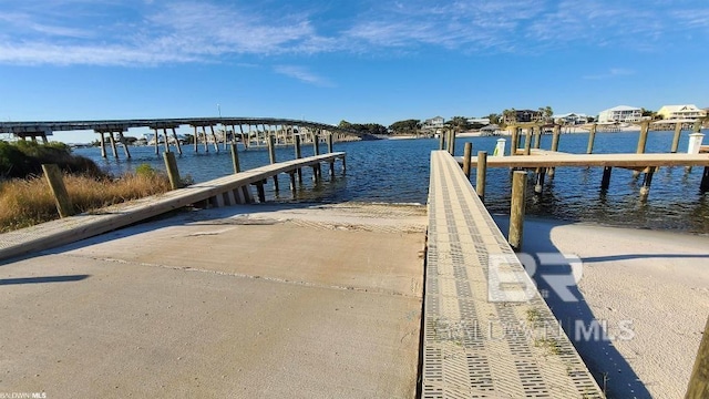 view of dock with a water view