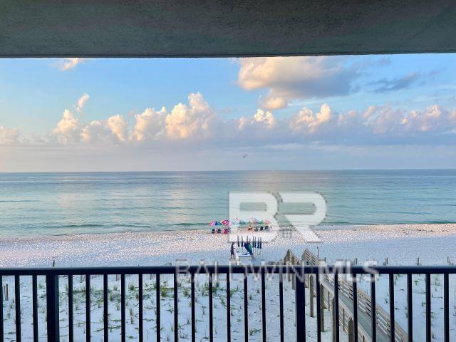 property view of water featuring a beach view