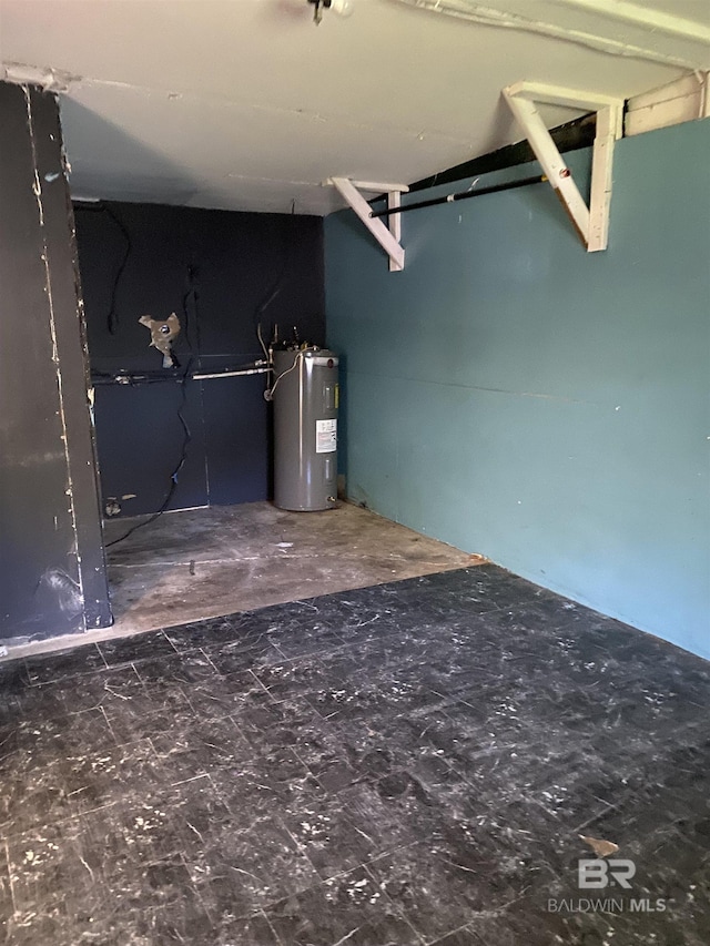 below grade area featuring water heater
