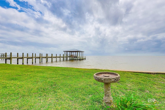 9581 S Bay Rd, Foley, AL 36535 - view of dock with a lawn and a water view