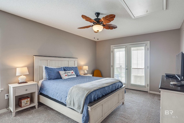 9581 S Bay Rd, Foley, AL 36535 - bedroom featuring access to exterior, ceiling fan, light carpet, a textured ceiling, and french doors