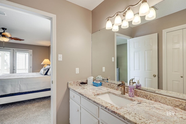 9581 S Bay Rd, Foley, AL 36535 - bathroom with vanity and ceiling fan