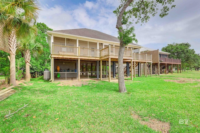 9581 S Bay Rd, Foley, AL 36535 - back of house featuring a wooden deck and a yard