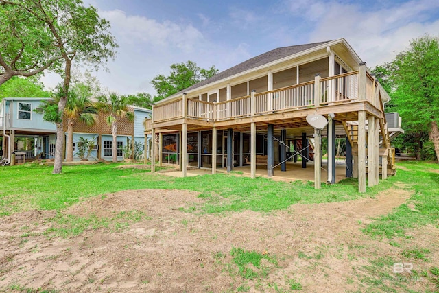 9581 S Bay Rd, Foley, AL 36535 - rear view of house with a wooden deck and a yard