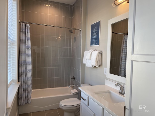 full bath featuring shower / bath combo, vanity, tile patterned flooring, and toilet