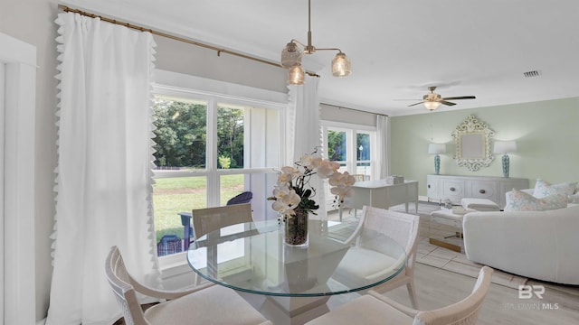 dining area featuring ceiling fan