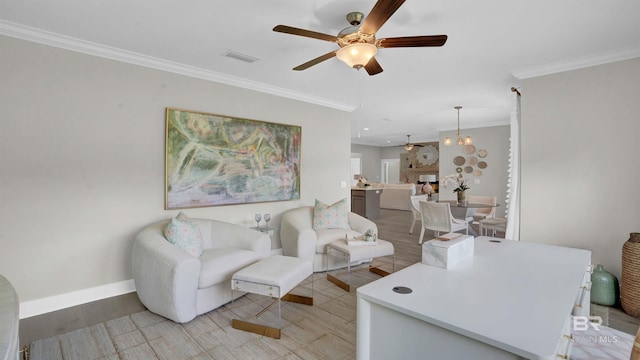 living room featuring crown molding, light hardwood / wood-style floors, and ceiling fan