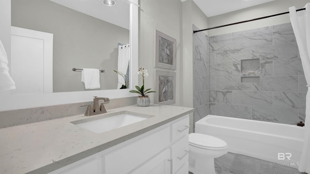 full bathroom featuring vanity, toilet, and shower / bath combo with shower curtain