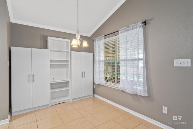 11097 Pontchartrain Loop, Daphne, AL 36526 - unfurnished dining area with ornamental molding, lofted ceiling, a chandelier, and light tile patterned floors