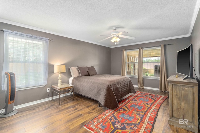 11097 Pontchartrain Loop, Daphne, AL 36526 - bedroom featuring wood finished floors, a textured ceiling, crown molding, and a ceiling fan