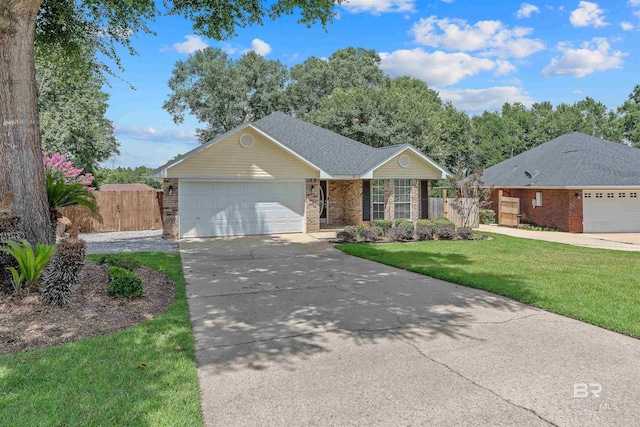 11097 Pontchartrain Loop, Daphne, AL 36526 - ranch-style home with brick siding, concrete driveway, a gate, and an attached garage