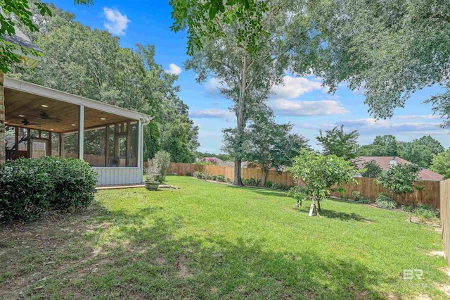 11097 Pontchartrain Loop, Daphne, AL 36526 - fenced backyard featuring a sunroom and a ceiling fan