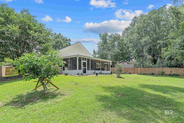 11097 Pontchartrain Loop, Daphne, AL 36526 - back of property featuring a sunroom and a fenced backyard