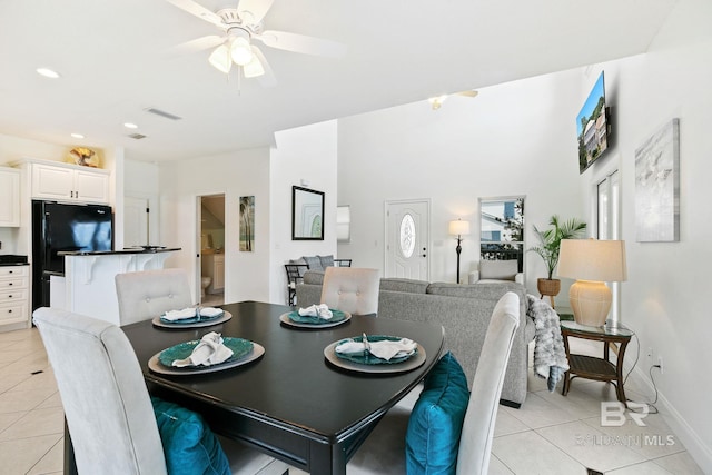 dining room featuring ceiling fan and light tile patterned floors