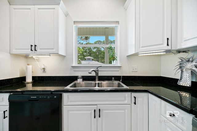 kitchen featuring sink, white cabinets, black dishwasher, and dark stone countertops