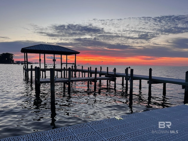 view of dock with a water view