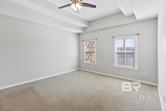 unfurnished room featuring ceiling fan, carpet, and baseboards