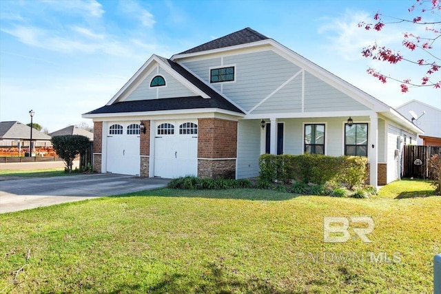 view of front of house with brick siding, a shingled roof, a garage, driveway, and a front lawn