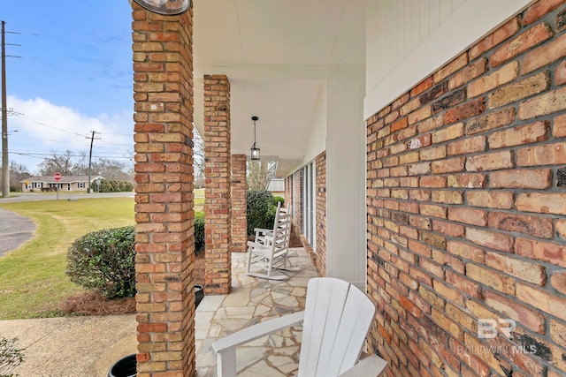 view of patio featuring a porch