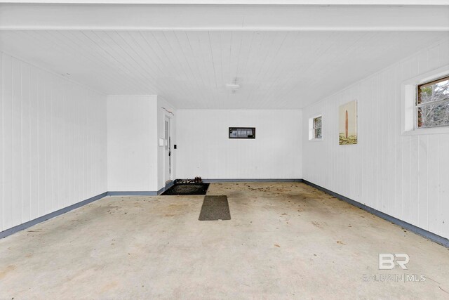 garage featuring baseboards