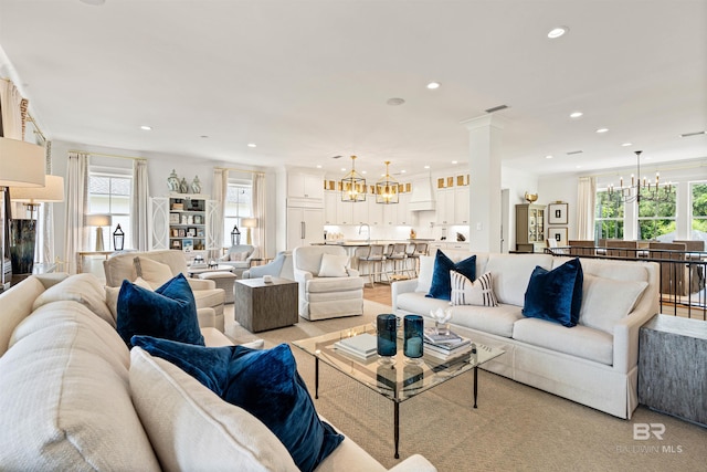 452 Colony Dr, Fairhope, AL 36532 - living area featuring recessed lighting, a wealth of natural light, visible vents, and an inviting chandelier