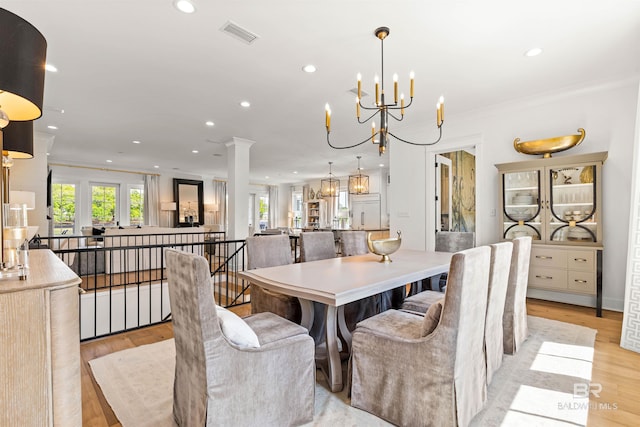 452 Colony Dr, Fairhope, AL 36532 - dining space with recessed lighting, an inviting chandelier, visible vents, light wood-style floors, and crown molding