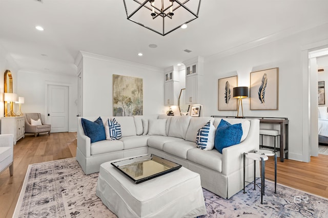452 Colony Dr, Fairhope, AL 36532 - living area with an inviting chandelier, light wood-style flooring, ornamental molding, visible vents, and recessed lighting
