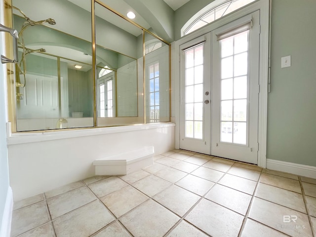 2210 W Beach Blvd, Gulf Shores, AL 36542 - entryway featuring french doors, tile patterned floors, and baseboards