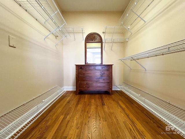 2210 W Beach Blvd, Gulf Shores, AL 36542 - walk in closet with wood finished floors