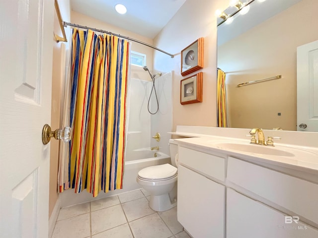 2210 W Beach Blvd, Gulf Shores, AL 36542 - full bath with tile patterned floors, toilet, vanity, and shower / bath combo with shower curtain