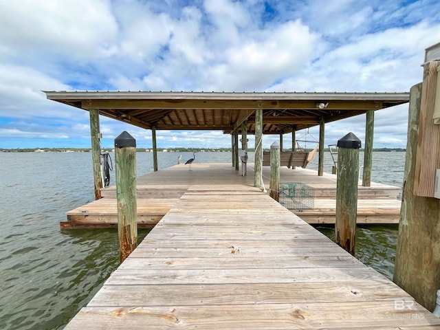 2210 W Beach Blvd, Gulf Shores, AL 36542 - view of dock with boat lift and a water view
