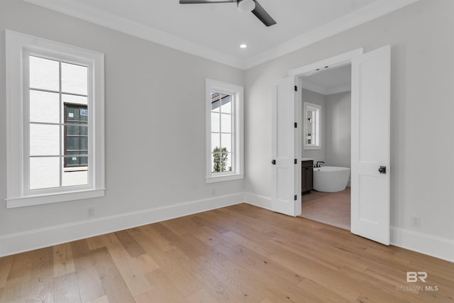 926 Inlet Cir, Gulf Shores, AL 36542 - empty room featuring a ceiling fan, light wood-style flooring, and ornamental molding