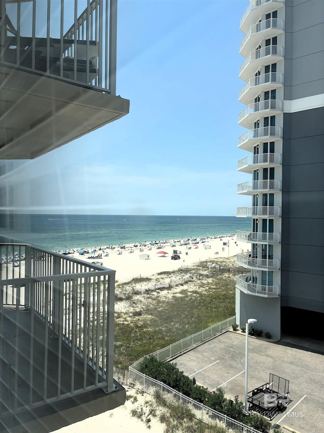 property view of water featuring a beach view