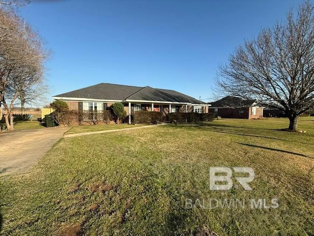 ranch-style house with a front yard