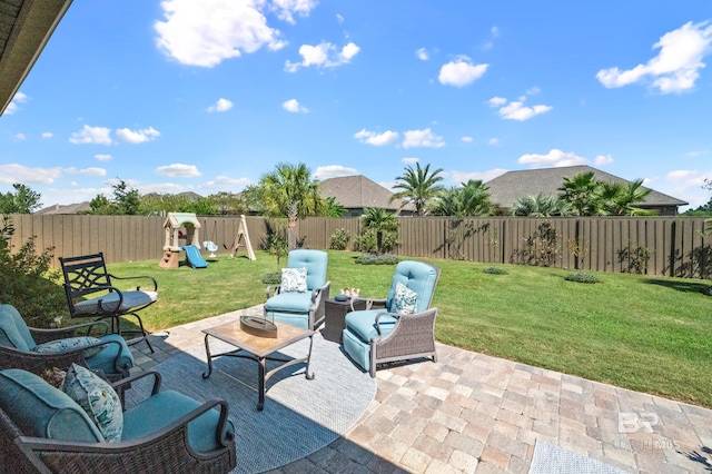 view of patio / terrace featuring a playground and outdoor lounge area