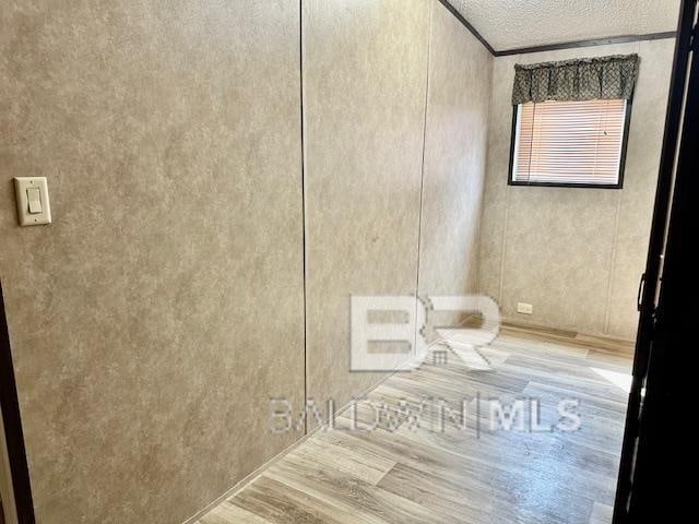 bathroom with wood-type flooring