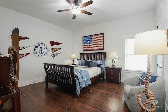 bedroom featuring dark hardwood / wood-style flooring and ceiling fan