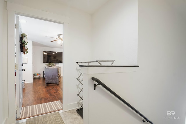 stairway featuring hardwood / wood-style flooring