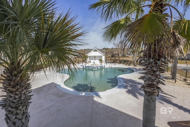 view of swimming pool featuring a patio