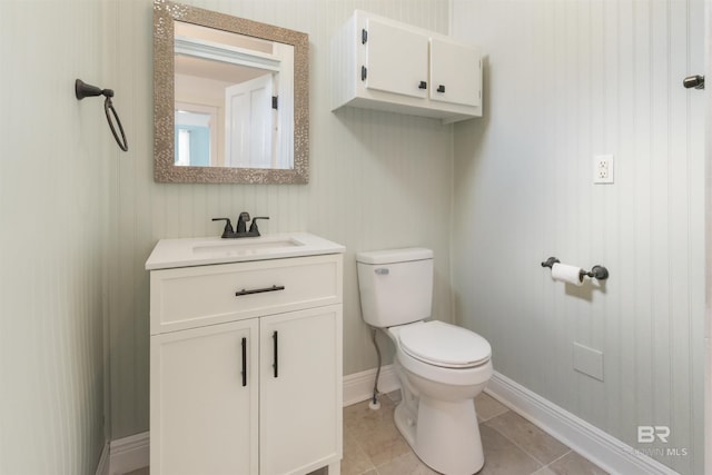 1206 Palmetto St, Mobile, AL 36604 - bathroom featuring toilet, vanity, baseboards, and tile patterned floors
