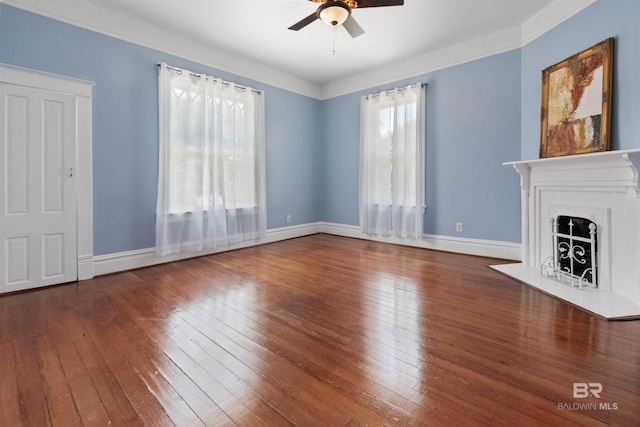 1206 Palmetto St, Mobile, AL 36604 - unfurnished living room with ceiling fan, hardwood / wood-style flooring, a fireplace, and baseboards
