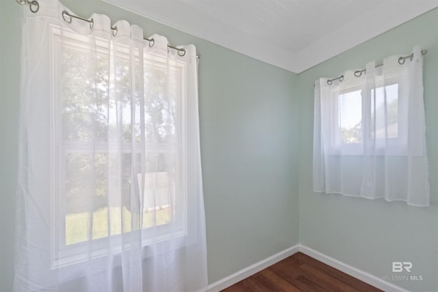 1206 Palmetto St, Mobile, AL 36604 - unfurnished room with dark wood-type flooring and baseboards