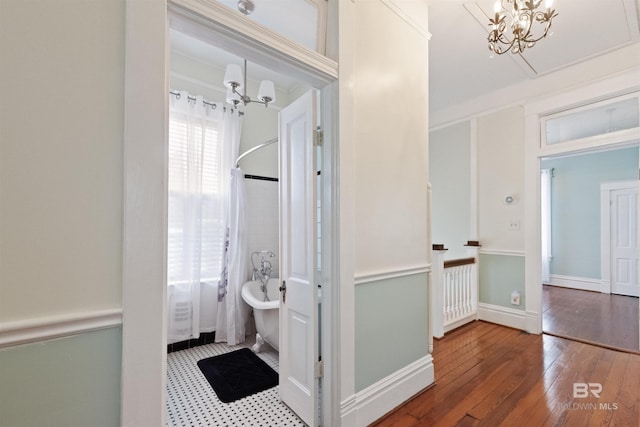 1206 Palmetto St, Mobile, AL 36604 - full bath featuring hardwood / wood-style flooring and shower / tub combo