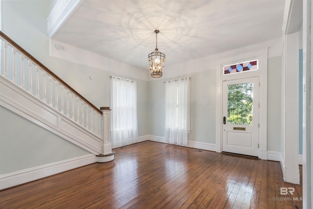 1206 Palmetto St, Mobile, AL 36604 - foyer with stairway, wood-type flooring, a chandelier, and baseboards