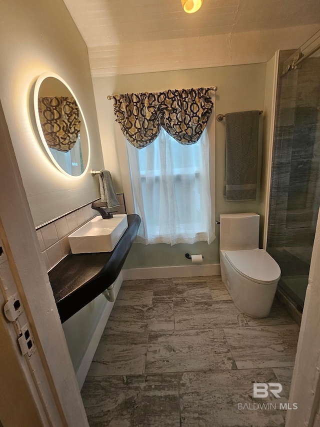 1206 Palmetto St, Mobile, AL 36604 - full bath with a shower stall, toilet, decorative backsplash, and a sink