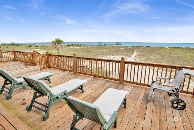 deck featuring a water view