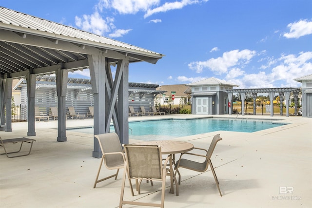 1044 Hayward Loop, Foley, AL 36535 - community pool with a pergola, a patio, and an outdoor structure