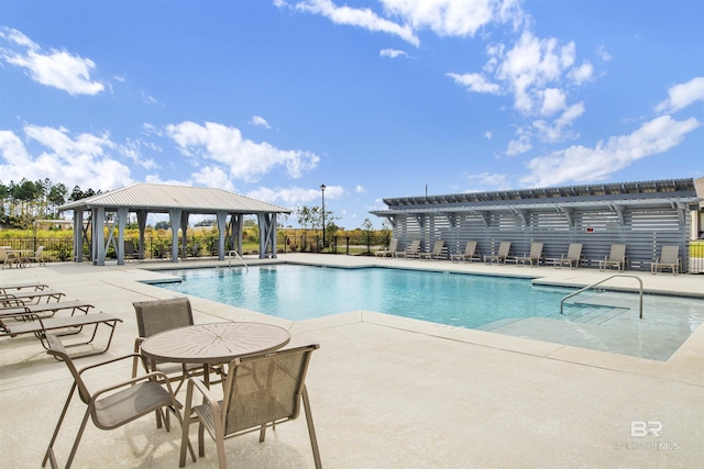 1044 Hayward Loop, Foley, AL 36535 - community pool with a patio and a gazebo